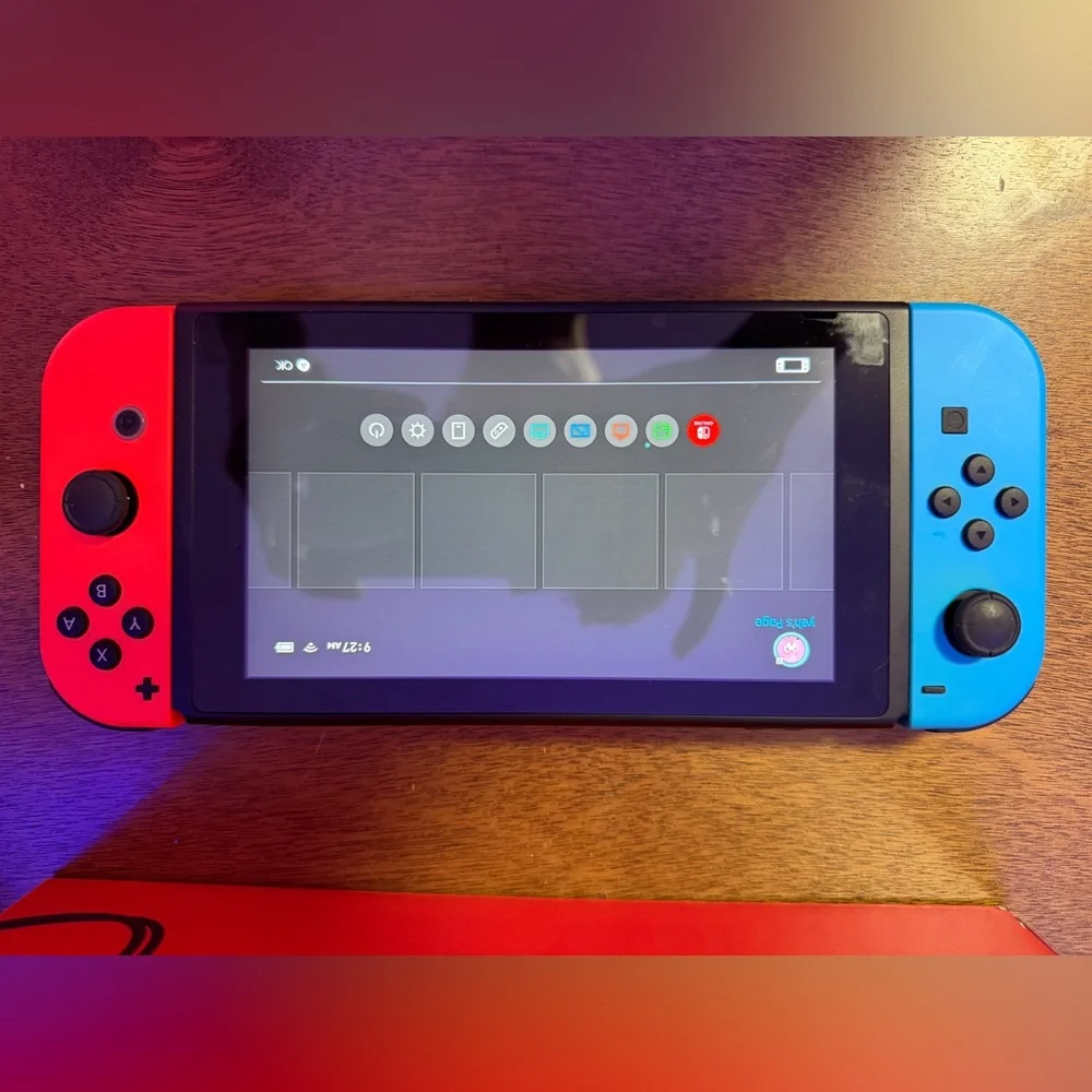 Nintendo Switch Console with Red and Blue Joy-Con